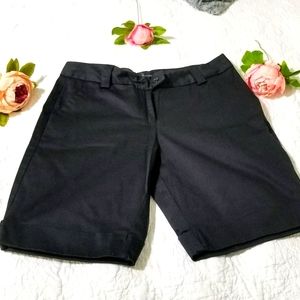 The limited long black shorts size 8